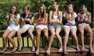 5 teens on phone 1 without she may get vibrating syndrome